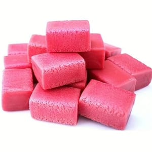 Colorful pieces of classic pink bubblegum, highlighting the sweet and nostalgic candy flavor.