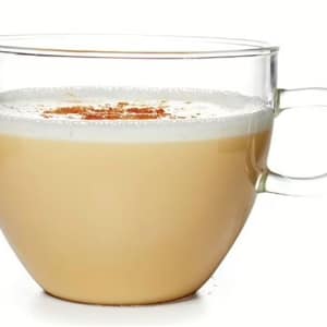 A steaming cup of chai tea surrounded by cinnamon sticks, cardamom pods, and cloves, highlighting its warm and spiced flavor.