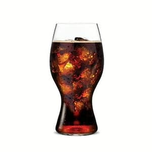 A glass of Coca-Cola with ice cubes and a fizzy top, showcasing its sweet, bubbly soda flavor.