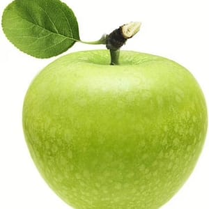 Fresh green apples sliced open with a sprinkle of sour sugar, highlighting the crisp and tangy flavor.