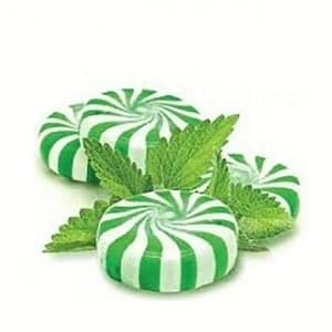 Bottle of Mint Candy vape juice with mint leaves and hard peppermint candies, highlighting its cool and sweet flavor.